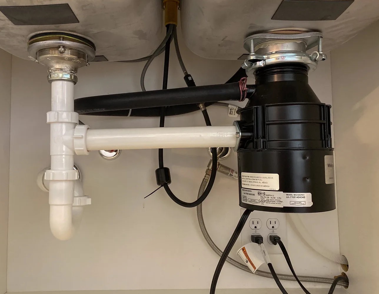 Leaky Garbage Disposal Cleanup in Burnsville, MN